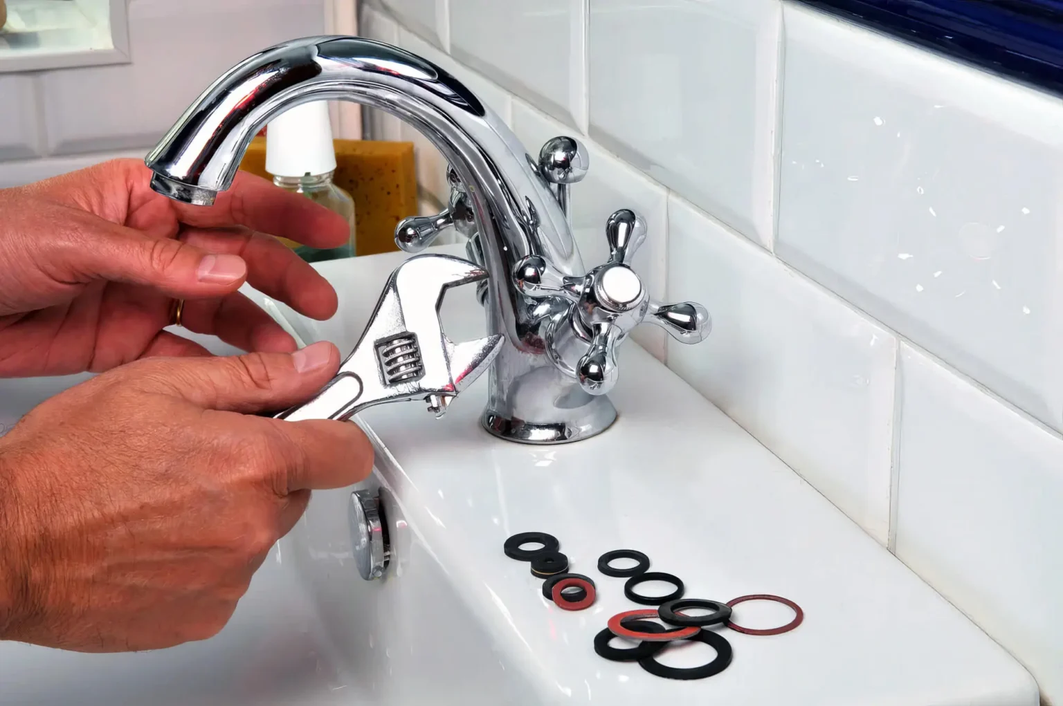 Plumber maintaining a bathroom faucet in Hacienda Heights